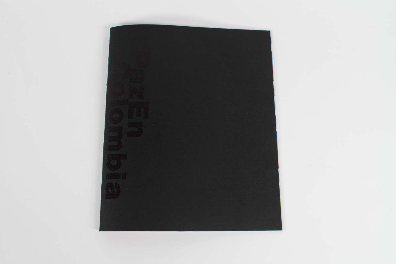 There is a black rectangle. Barely legible is "PazEn Colombia" written vertically in darker black.