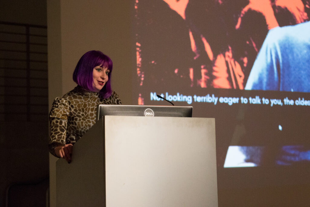 Not looking terribly eager to talk to you is being projected onto the walls of the EDA pit.