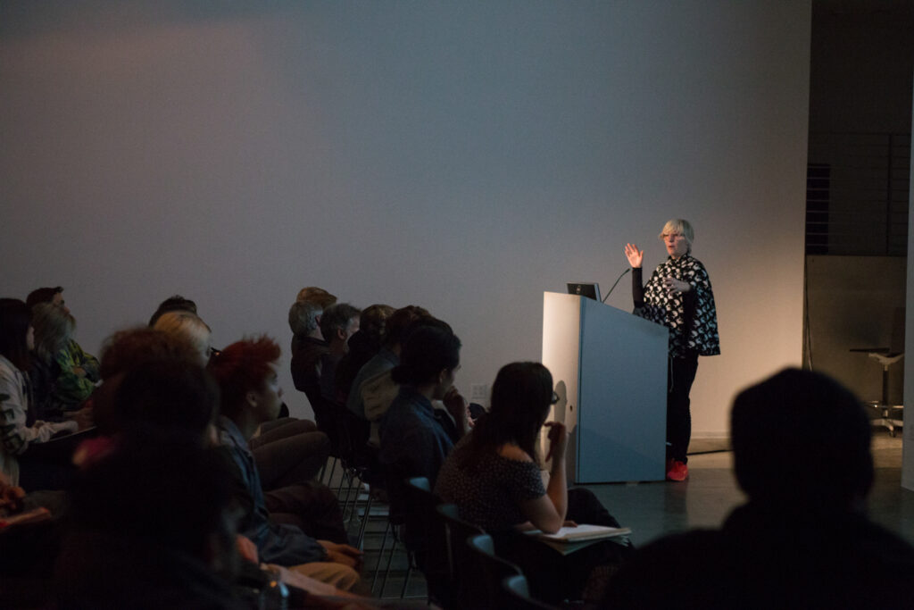 Audience listening to Helen Molesworth.