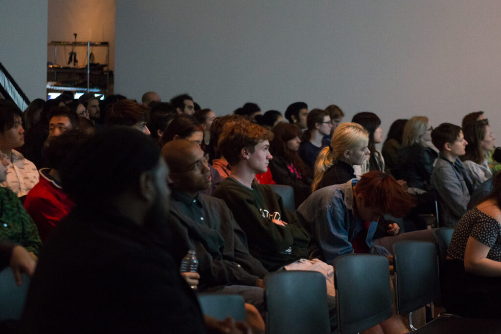 Audience listening to Helen Molesworth.