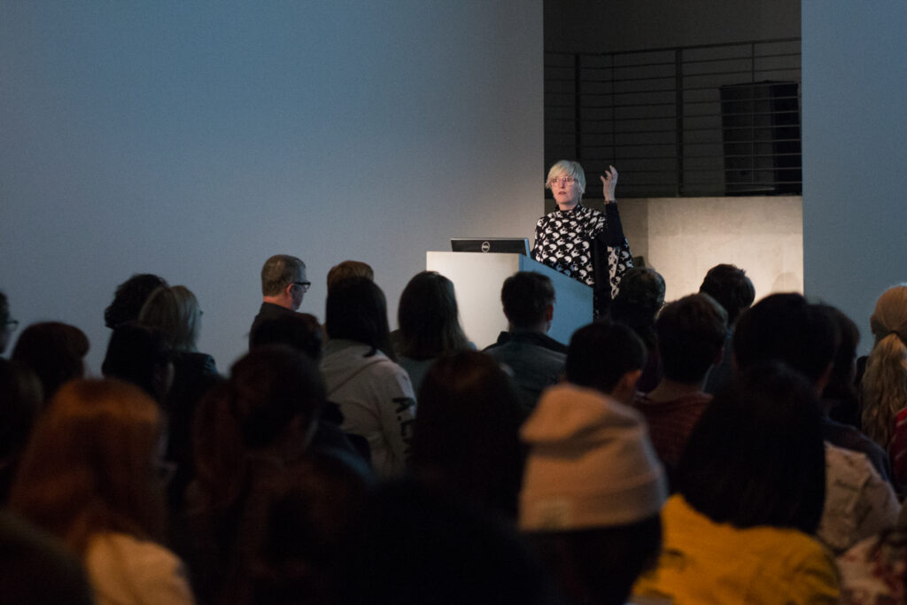 Helen Molesworth showing a slide during her presentation in the EDA pit.