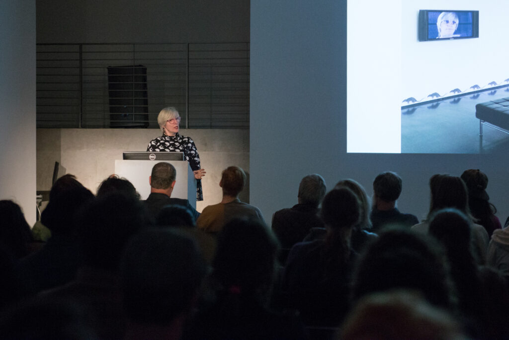 Helen Molesworth showing a slide during her presentation in the EDA pit.