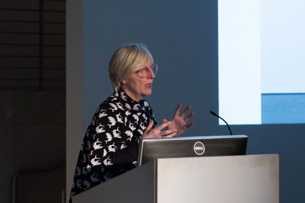 Helen Molesworth showing a slide during her presentation in the EDA pit.