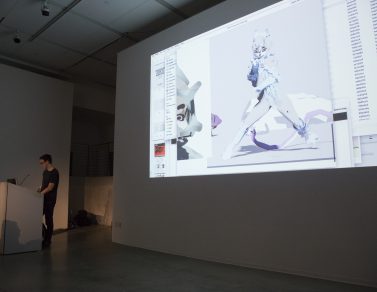 Ian Cheng presenting his work.