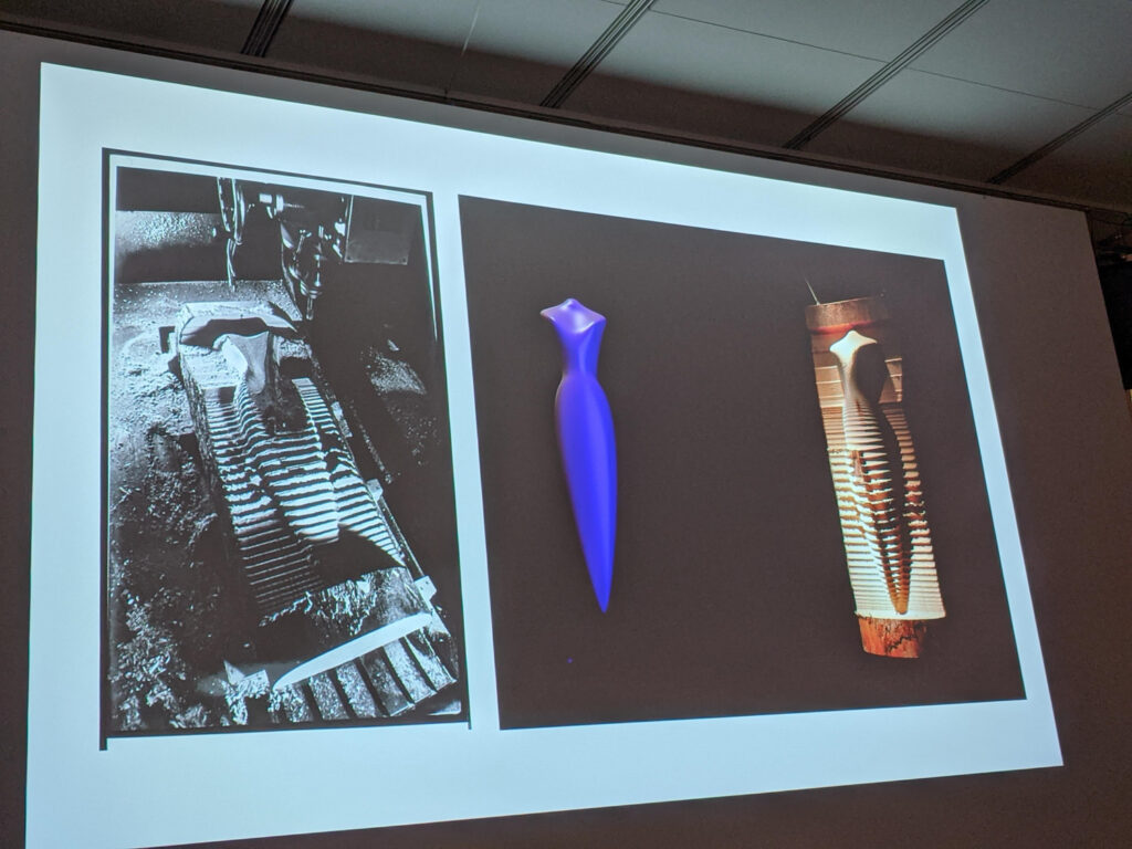 Triptych of three human busts next to each other are projected onto the walls of the EDA pit.