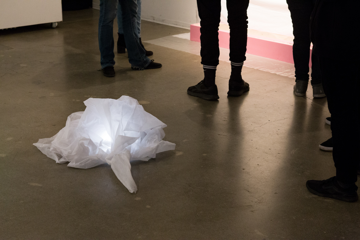 White fabric sitting on the floor at Sam Congdon's solo show.