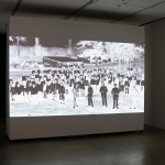 Video Projection showing a large group of people