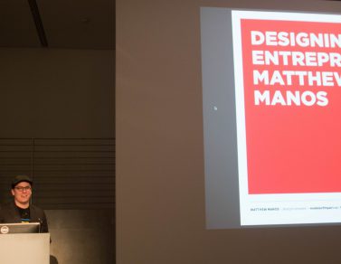 Matthew Manos presenting his work. The presentation is titled "Designing Entrepreneur".