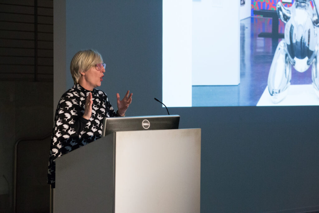 Helen Molesworth showing a slide during her presentation in the EDA pit.