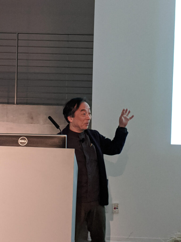 MASAKI FUJIHATA gestures to the crowd during his artist presentation in the EDA pit.